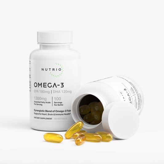 NUTRIO Omega-3 Fish Oil bottle beside an open bottle with golden softgels spilling onto the surface
