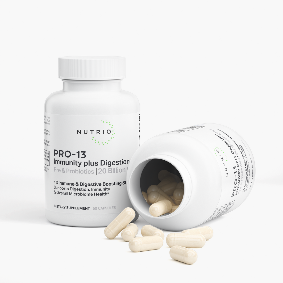 NUTRIO PRO-13 probiotic bottle beside an open bottle with cream-colored capsules spilling out