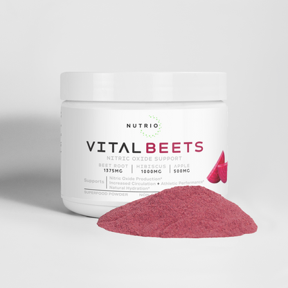 NUTRIO Vital Beets Hibiscus + Apple tub with a pile of deep pink superfood powder in front