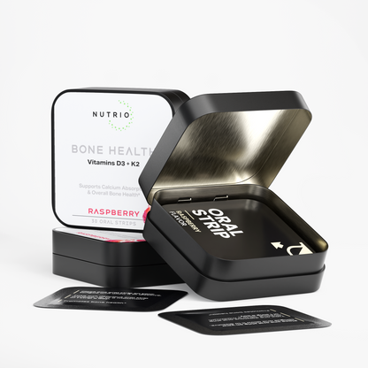 Open NUTRIO Bone Health tin with individually wrapped Raspberry oral strips, closed tin in the background
