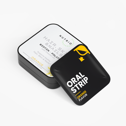 NUTRIO Hair, Skin & Nails tin lying flat with a Orange flavor oral strip pouch propped against the lid